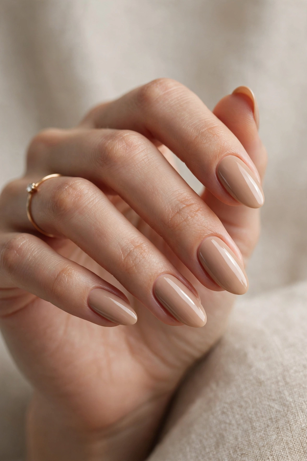 Classic nude almond nails elegant manicure